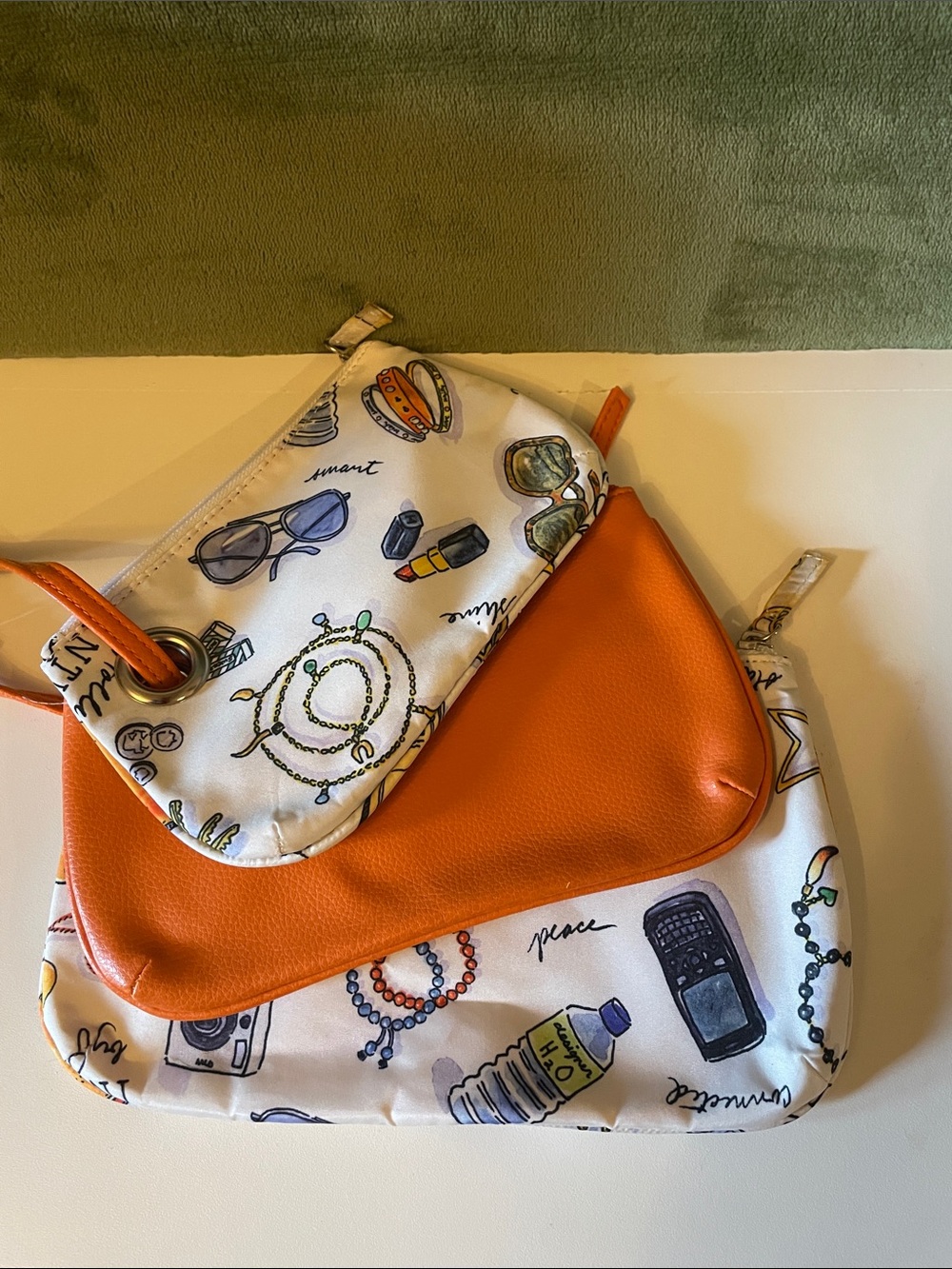 3 Piece Set of Cosmetic Bags; 1-Orange(Non/leather), 2- Multicolored(Cloth)